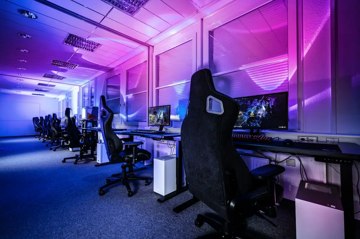 Gaming room lit in purple and blue