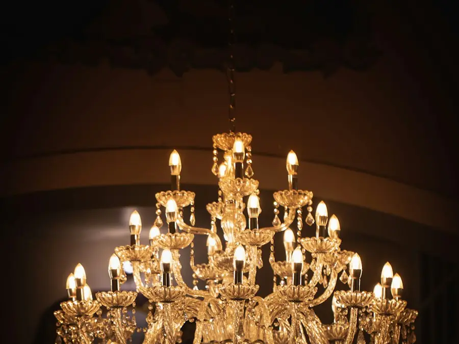 Brass chandelier glowing in a dark room