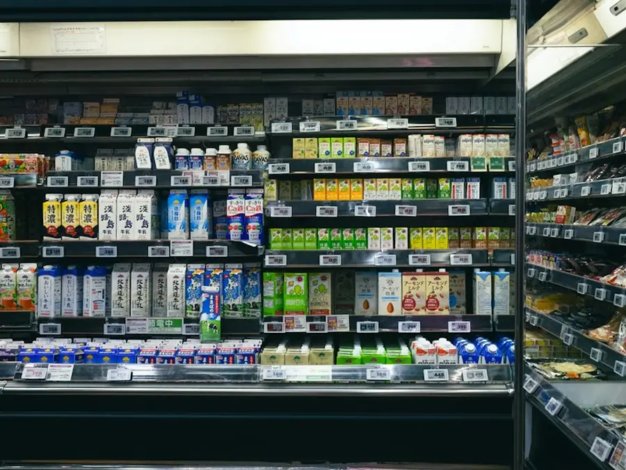 Shelves of drinks and packaged goods