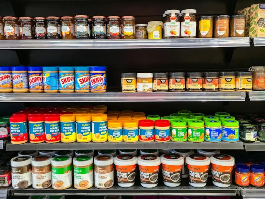 Shelves of jars and household goods